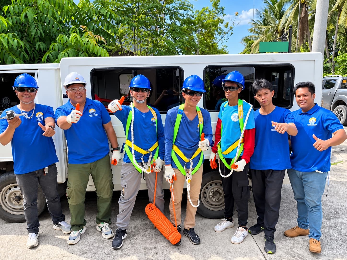 Visayan Solar installers on a rooftop solar array